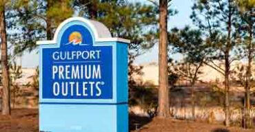 Pictured: The GulfPort Premium Outlets sign in Gulfport Mississippi.