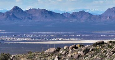 This is an image of a wide valley between mountains in Las Cruces. ASTA-USA provides professional translation services in this city.