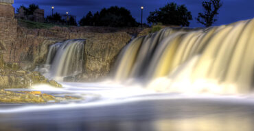 This is an image of a waterfall in Sioux Falls. ASTA-USA provides professional translation services in this city.