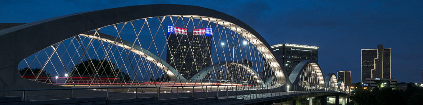 This is an image of a bridge in front of a cityscape in Fort Worth Texas where ASTA-USA provides professional translation services.
